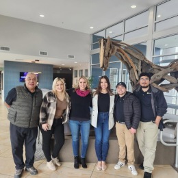 a group of people posing for a picture