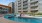 a pool in front of a building
